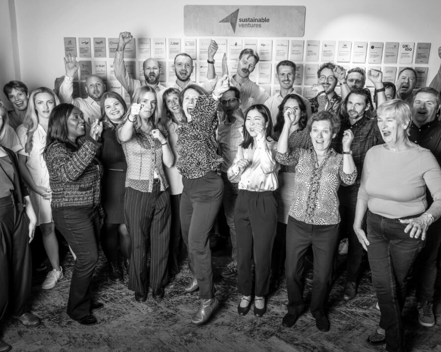 Team staff happy punching air BW 1